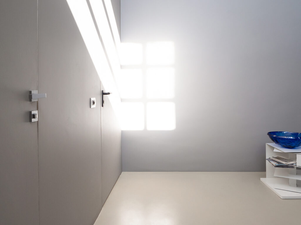 Porte filomuro Avellino: Rivestimento Continuum- Procrea Superfici